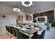 Open-concept living space with formal dining area and modern living room for seamless entertainment at 6301 Sand Skipper Rd, Orlando, FL 32821