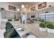 Modern kitchen featuring stainless steel appliances, countertops with bar seating and pendant lighting at 6301 Sand Skipper Rd, Orlando, FL 32821