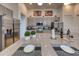 Close-up of kitchen featuring stainless steel appliances and counter seating at 6301 Sand Skipper Rd, Orlando, FL 32821