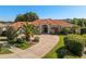 Beautiful single-story home featuring a terra cotta roof, manicured landscaping, and a paver driveway at 709 Cricklewood Ter, Lake Mary, FL 32746