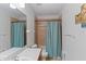 Full bathroom with tub and shower featuring a ceramic tile surround at 7351 Spring Mountain Ln, Yalaha, FL 34797
