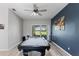 Game room with pool table and access to the patio at 7351 Spring Mountain Ln, Yalaha, FL 34797
