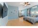 Spacious bedroom with hardwood floors, recessed lighting, and windows at 7351 Spring Mountain Ln, Yalaha, FL 34797