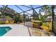 A lush backyard with patio area, perfect for entertaining and relaxation at 8444 Sandberry Blvd, Orlando, FL 32819