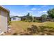 A spacious yard with a pool area offers an oasis for outdoor relaxation at 8444 Sandberry Blvd, Orlando, FL 32819
