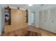 Bedroom features beautiful wood floors, built in shelving and double door closet at 8444 Sandberry Blvd, Orlando, FL 32819