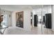 Welcoming foyer with tile flooring, decorative wall art, and view to living areas with bright light at 8444 Sandberry Blvd, Orlando, FL 32819