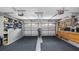 Attached garage with a two-car capacity provides ample space for vehicles and storage at 8444 Sandberry Blvd, Orlando, FL 32819