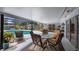 Enclosed lanai with views of backyard and in-ground pool, great for entertaining guests at 8444 Sandberry Blvd, Orlando, FL 32819