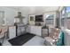 Outdoor kitchen area with stainless steel grill and mini fridge at 8444 Sandberry Blvd, Orlando, FL 32819