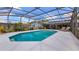 A screened-in pool with a spacious patio perfect for outdoor relaxation at 8444 Sandberry Blvd, Orlando, FL 32819