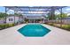 Screened pool with patio and landscaped backyard offers a relaxing retreat at 8444 Sandberry Blvd, Orlando, FL 32819