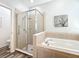 Bathroom features a luxurious tub and separate shower at 865 Bay Bridge Cir, Apopka, FL 32703