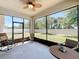 Comfortable screened-in patio featuring ample space and a ceiling fan for relaxing at 865 Bay Bridge Cir, Apopka, FL 32703