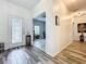 Inviting entryway with decorative door and view into the adjacent office at 865 Bay Bridge Cir, Apopka, FL 32703