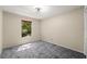 Bedroom features neutral decor, large window for natural light and closet at 992 Woodrose Ct, Altamonte Springs, FL 32714