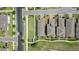 Aerial view of homes shows manicured lawns and brick driveways at 10006 Quail Meadow Aly, Winter Garden, FL 34787