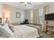 Comfortable bedroom with natural light, modern furnishings, and neutral color palette at 10006 Quail Meadow Aly, Winter Garden, FL 34787