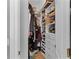 Walk-in closet offers ample shelving and storage space for an organized wardrobe at 1008 W Riviera Blvd, Oviedo, FL 32765