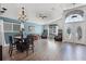 Inviting living room with wood floors, recessed lighting and plenty of room to entertain at 1008 W Riviera Blvd, Oviedo, FL 32765