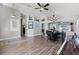 Spacious living room with wood floors, neutral walls and lots of natural light at 1008 W Riviera Blvd, Oviedo, FL 32765