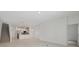 Open-concept living area with tile floors, modern lighting, and seamless transition to the kitchen at 1096 Happy Forest Loop, Deland, FL 32720