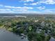Highlighted aerial view showcases the neighborhood's desirable location with waterfront homes and serene lake setting at 1105 Lake Nettie Dr, Eustis, FL 32726