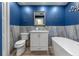 Contemporary bathroom featuring a soaking tub and modern fixtures at 1105 Lake Nettie Dr, Eustis, FL 32726