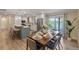 Eat-in kitchen with stainless steel appliances and water views at 1105 Lake Nettie Dr, Eustis, FL 32726