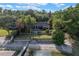 Stunning waterfront home with a private dock, pool, and lush landscaping at 1105 Lake Nettie Dr, Eustis, FL 32726