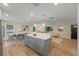Bright, open floor plan with sleek finishes and ample seating at 1105 Lake Nettie Dr, Eustis, FL 32726