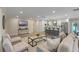 Bright, open floor plan with sleek finishes and ample seating at 1105 Lake Nettie Dr, Eustis, FL 32726