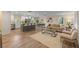 Open-concept living room, dining, and kitchen area with modern finishes at 1105 Lake Nettie Dr, Eustis, FL 32726