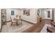 Well-lit home office area with stylish decor and hardwood floors at 1105 Lake Nettie Dr, Eustis, FL 32726