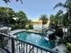 Beautiful pool and spa with waterfall feature overlooks lake at 1105 Lake Nettie Dr, Eustis, FL 32726
