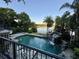 From an elevated vantage point, observe the beautiful lake, complemented by a pool with a rock waterfall feature at 1105 Lake Nettie Dr, Eustis, FL 32726