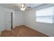 Bright bedroom with large window and closet at 111 E Caroline St, Tavares, FL 32778