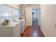 Spacious laundry area with modern appliances and ample natural light from a large window at 111 E Caroline St, Tavares, FL 32778