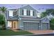 Charming two-story home with a symmetrical facade, gray siding, stone accents, and a large, three-car garage at 1157 Basalt Ln, Sanford, FL 32771