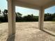 View of the backyard from the covered outdoor patio with pavers at 1157 Basalt Ln, Sanford, FL 32771