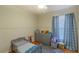 bedroom featuring playful decor, hardwood floors, and a cozy atmosphere for children at 1161 Hackberry Dr, Orlando, FL 32825