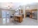 Spacious kitchen with a center island, stainless steel appliances, and an open view of the living area at 1161 Hackberry Dr, Orlando, FL 32825