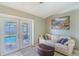 Cozy living room area with access to the pool, featuring comfortable seating and decor at 1161 Hackberry Dr, Orlando, FL 32825