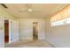 Bedroom with ceiling fan and en-suite bathroom at 1221 Adams St, Longwood, FL 32750