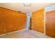 Spacious bedroom featuring cork-covered walls, neutral carpet, and ample natural light at 1221 Adams St, Longwood, FL 32750