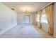 Bright living room with carpet, a chandelier and natural light at 1221 Adams St, Longwood, FL 32750