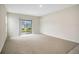 Bright and airy living room with sliding glass doors leading to outdoor space at 1221 August Sky Dr, Deltona, FL 32738