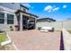 A spacious backyard patio with outdoor seating area, ideal for entertaining and relaxing at 13320 Magnolia Valley Dr, Clermont, FL 34711