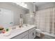 Bright bathroom with a double vanity sink, neutral paint, and modern finishes for a relaxing and functional space at 13320 Magnolia Valley Dr, Clermont, FL 34711