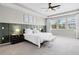 Elegant main bedroom with tray ceilings, large windows, and luxurious decor at 13320 Magnolia Valley Dr, Clermont, FL 34711